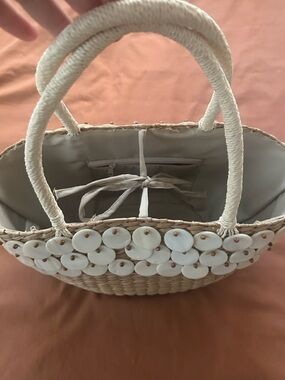 Two's Company Beige and Tan Woven bag with cream shell detail